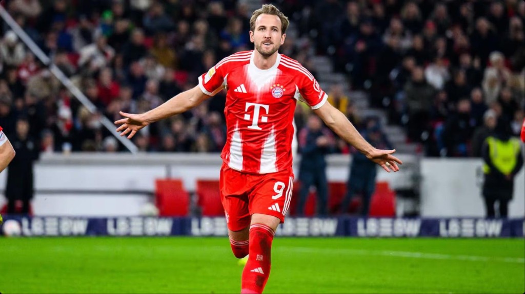 Harry Kane celebrating his hat trick for Bayern Munich